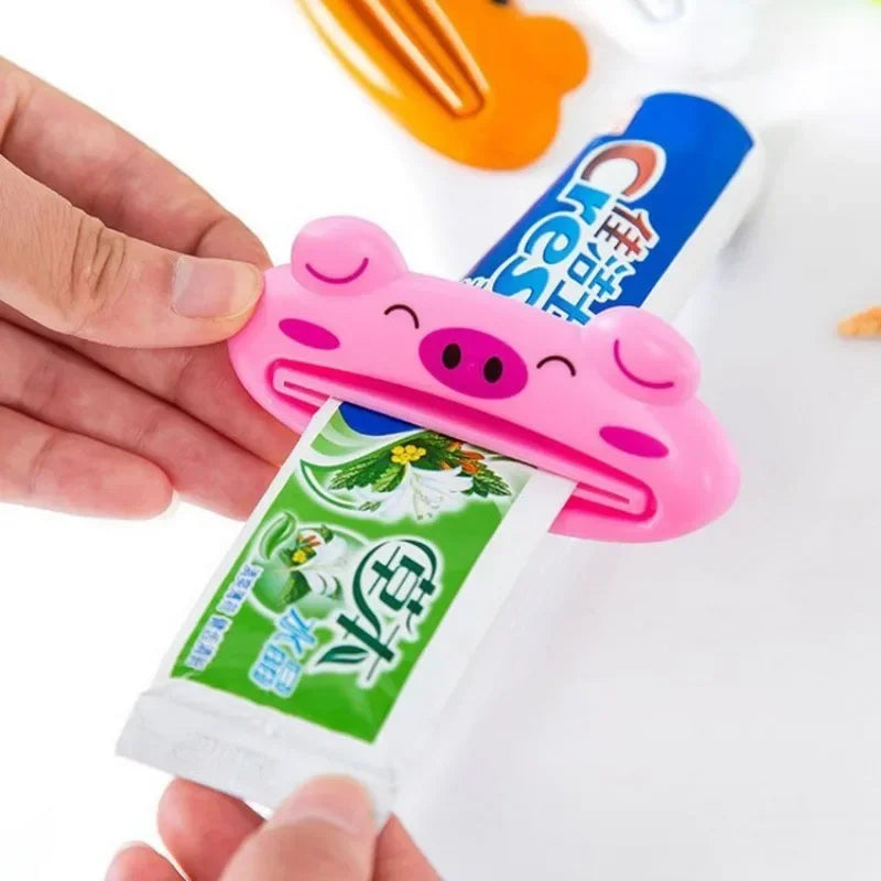 Cartoon Rolling Toothpaste Squeezer Dispenser for Kids – Tube Saver Holder (1.6 x 3.5 in / 4 x 9 cm) – 1 or 2-Pack